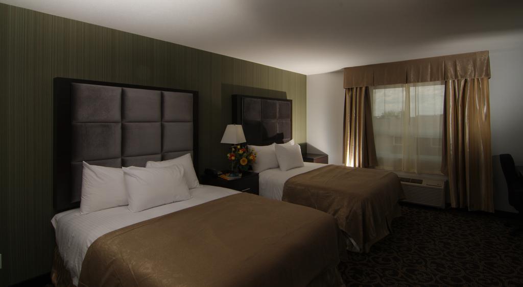 Paradise Inn&Suites Redwater Rom bilde