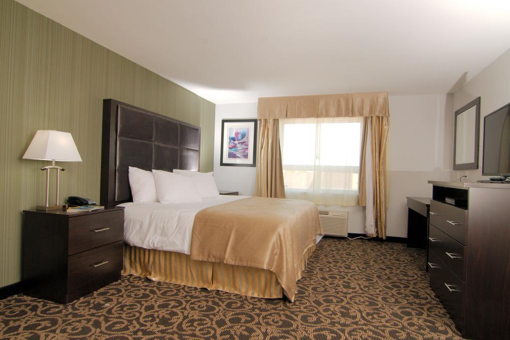 Paradise Inn&Suites Redwater Rom bilde